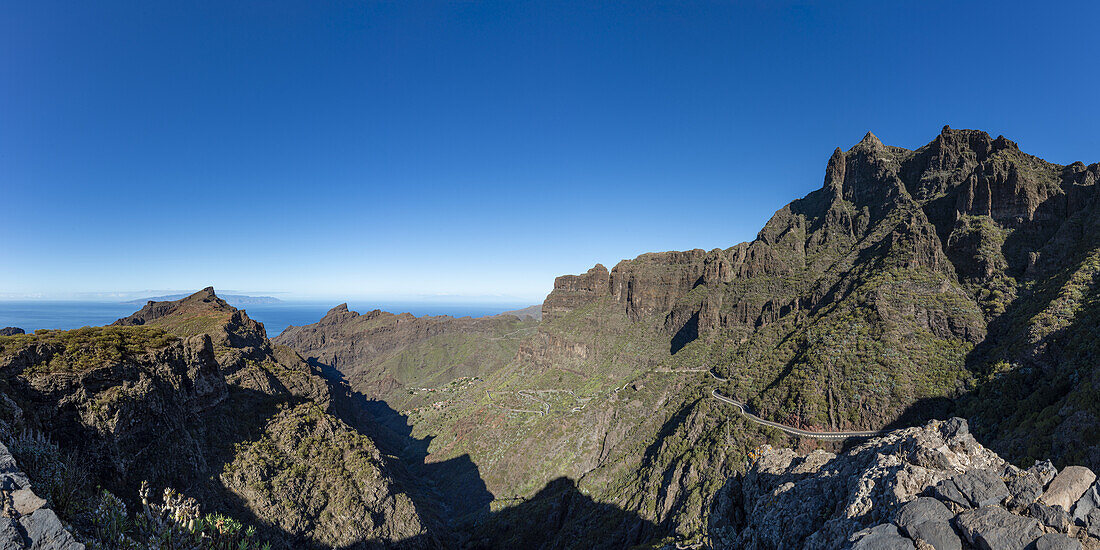  The mountain village of Masca surrounded by volcanic rock formations and the Masca Gorge, Barranco de Masca, Teno Mountains, Tenerife, Canary Islands, Spain, Europe 