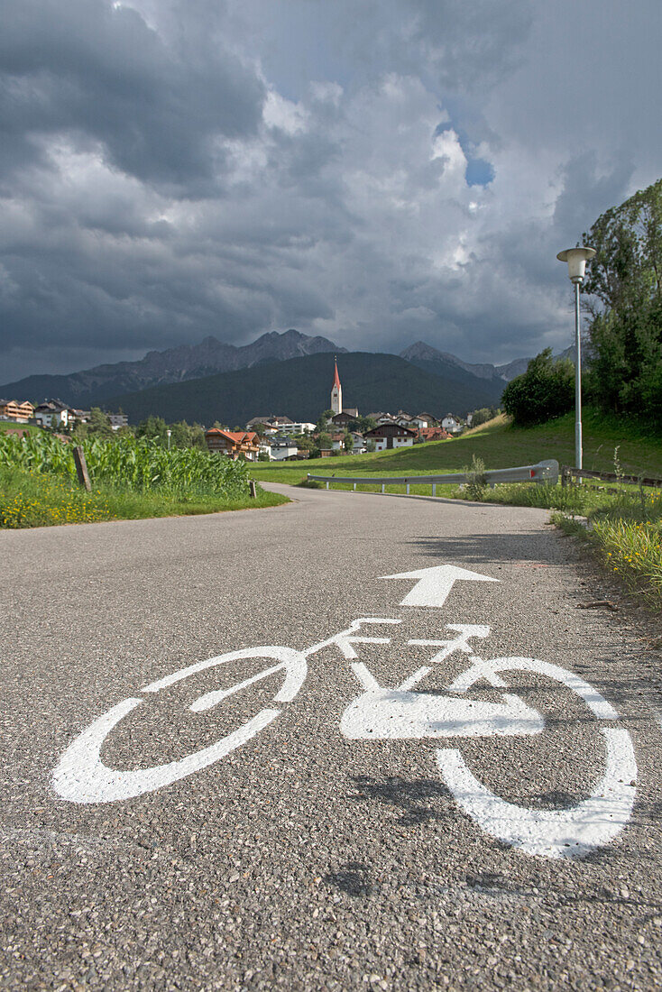 road marking for shared car and cycle lane near the village of Valdaora di Sotto (German:Niederolang)Trentino-Alto Adige, Sudtyrol, South Tyrol, Italy, South-central Europe