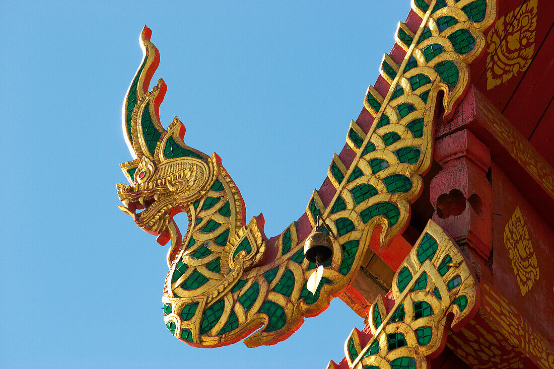 Close up of an ornate Naga finial in Wat Phrathat Doi Suthep, a highly revered Buddhist temple in Chiang Mai, Thailand.