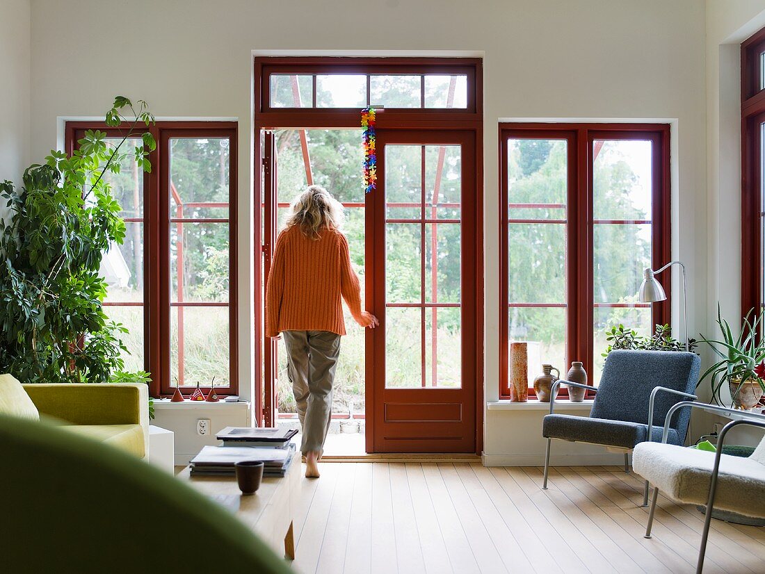 A living room with terrace doors