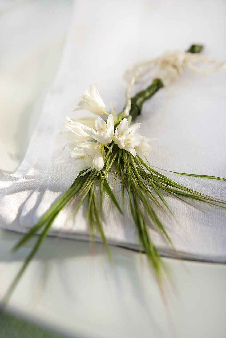 Place setting decoration for a wedding - Spanish bluebells and meadow grass flowers