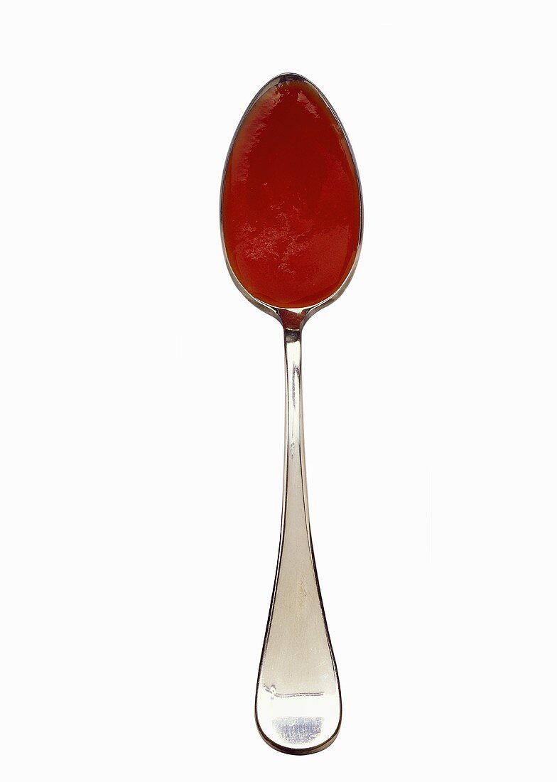 Silberlöffel mit Tomatencremesuppe