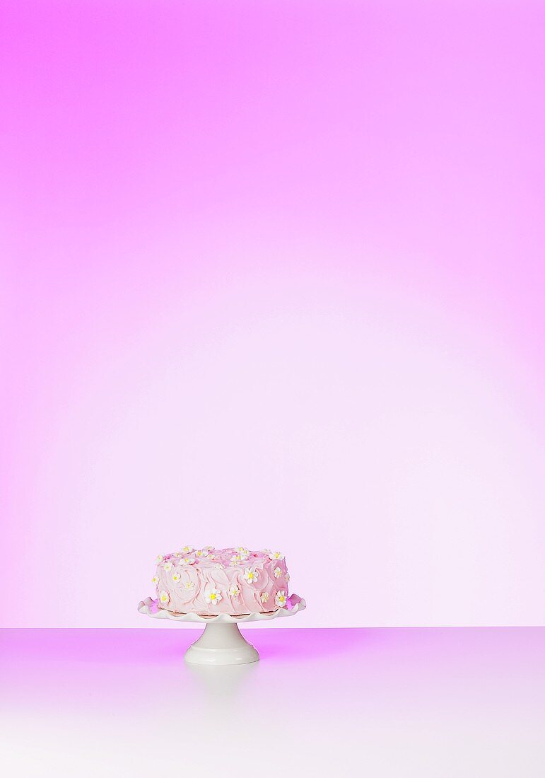 Pink cake with sugar flowers