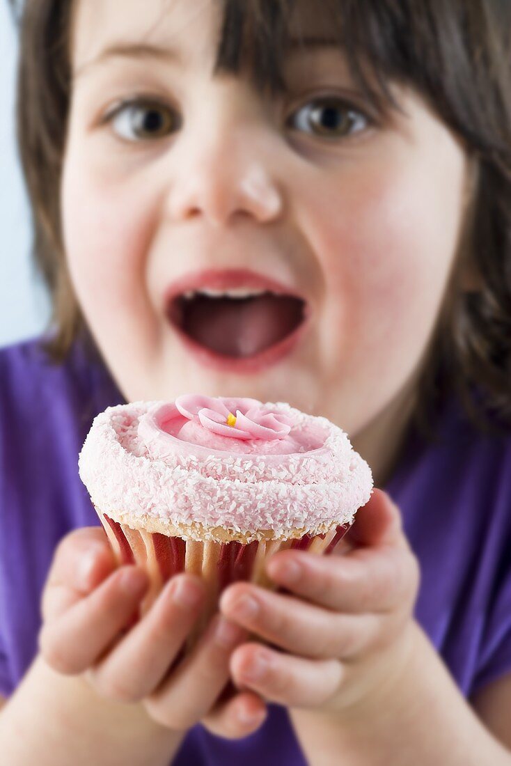 Girl eating cupcake