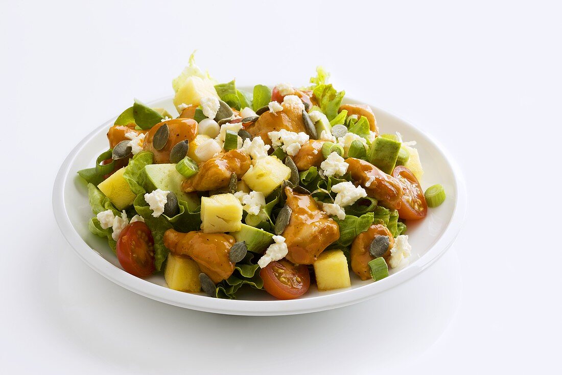 Vegetable salad with pineapple, chicken and feta