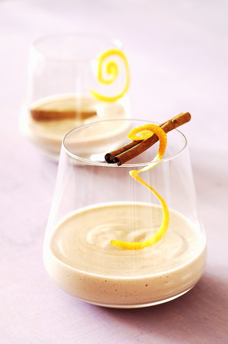 Mulled wine zabaglione with cinnamon sticks and orange peel