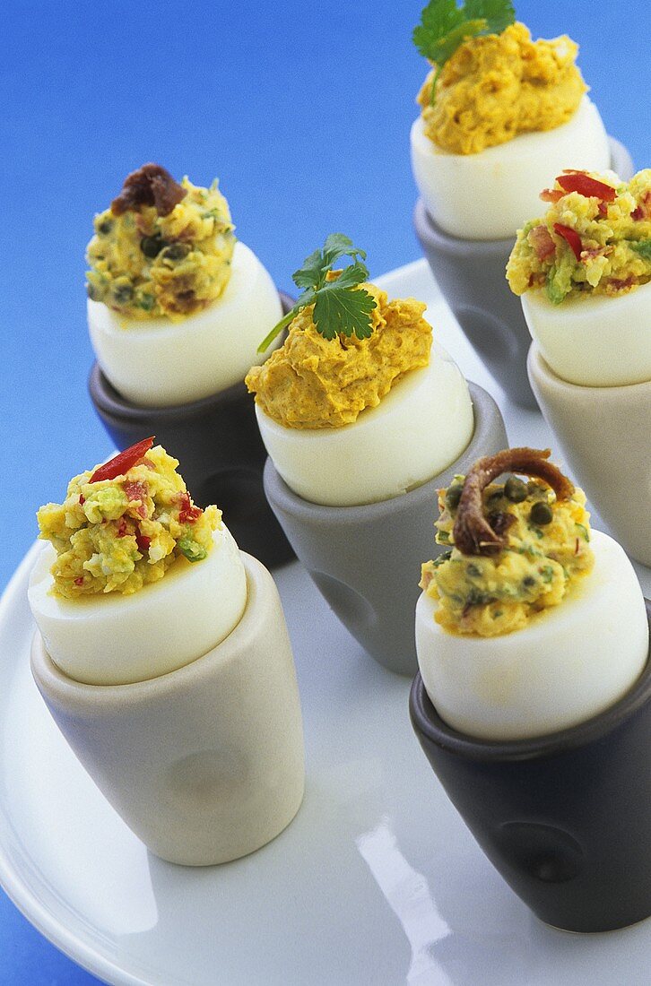 Stuffed eggs in egg cups