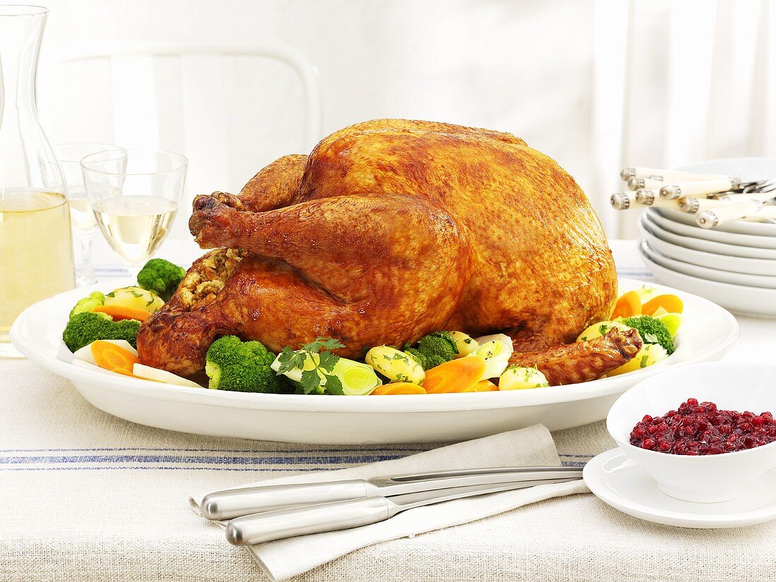Roast turkey with vegetables and cranberries