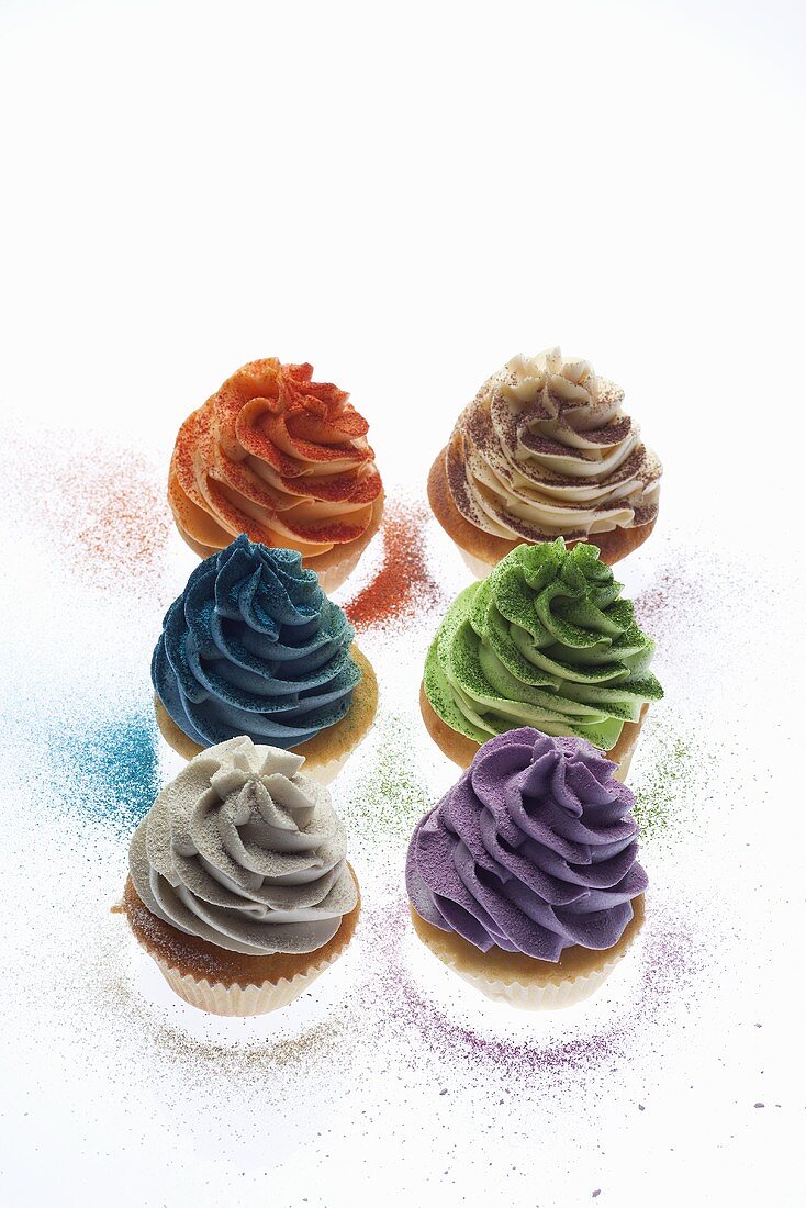 Cupcakes topped with coloured cream