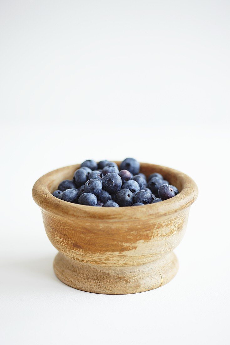 Blueberries in a wooden bowl