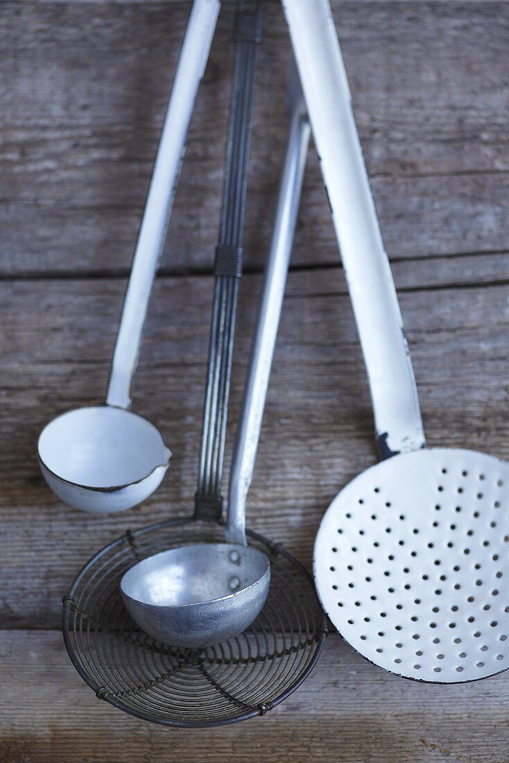 Various ladles and a draining spoon