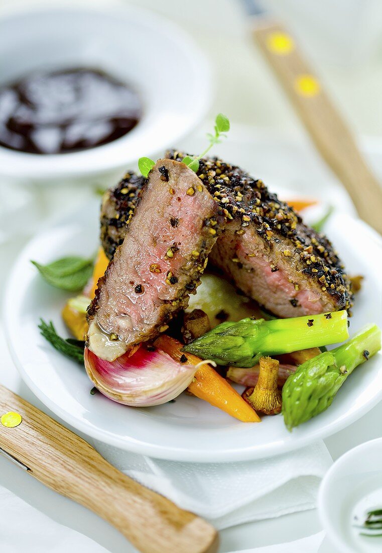 Grilled Argentinian beef with spring vegetables and chanterelle mushrooms