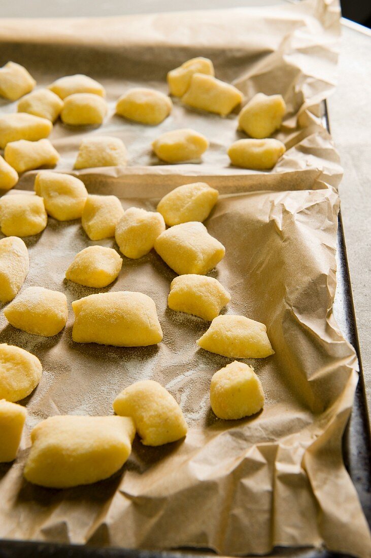 Potato gnocchi on a baking tray