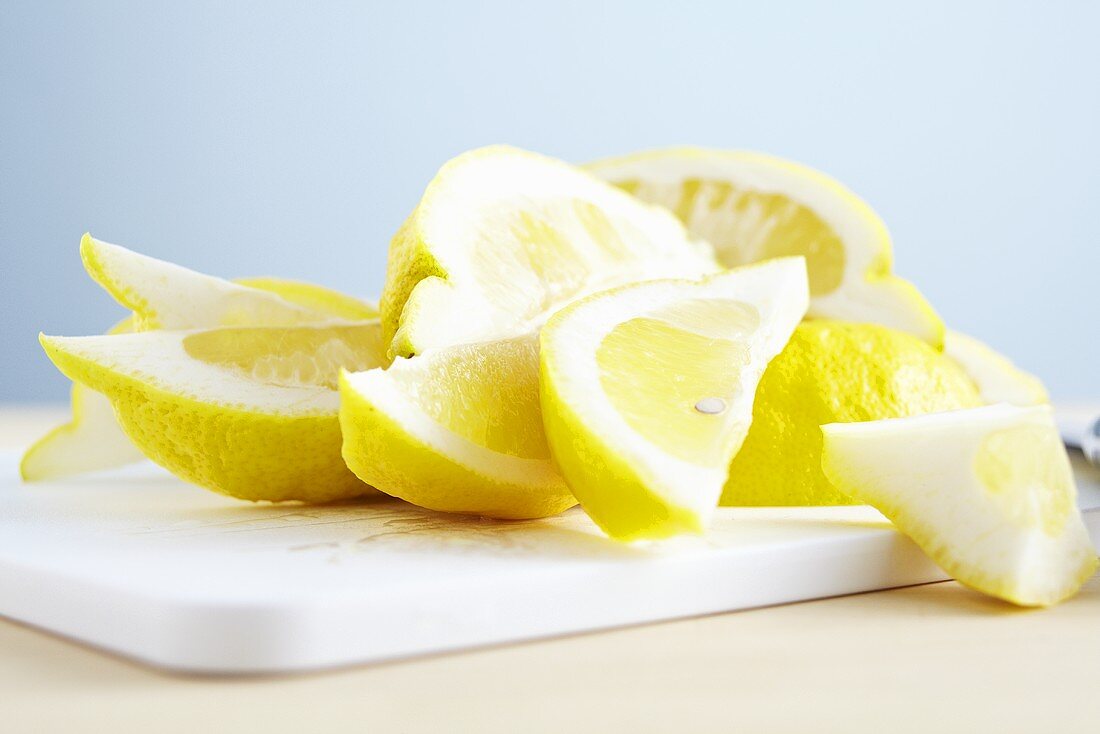 Lemon slices on a chopping board