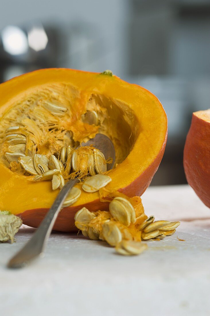 Removing the seeds from a Hokkaido squash