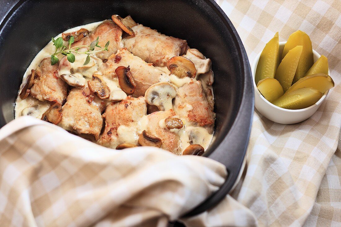 Rabbit cutlets with mushrooms in cream sauce