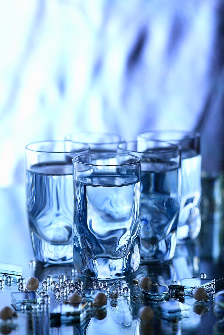 Several vodka glasses
