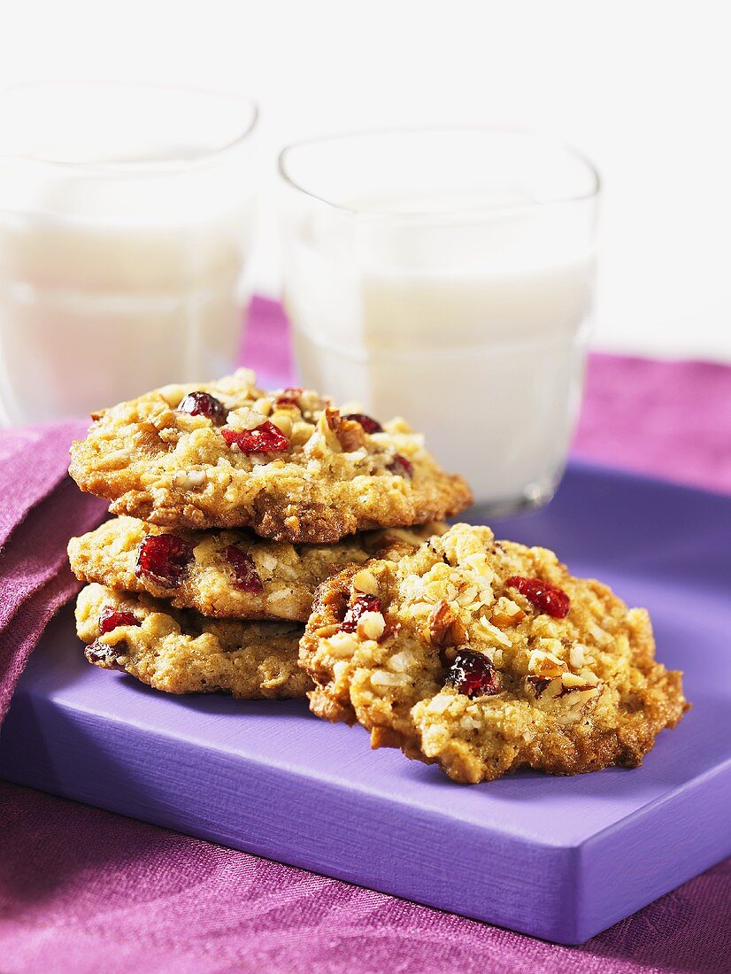 Oatmeal cookies with dried fruit, glass of milk