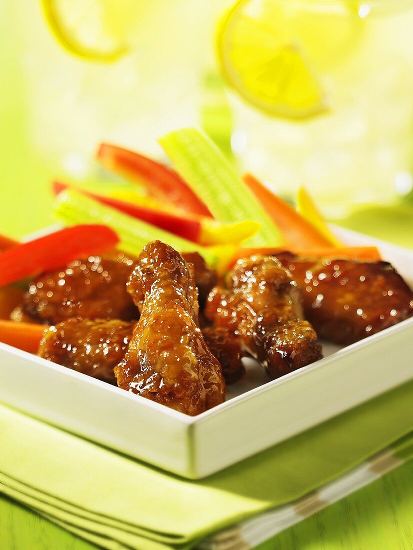 Glazed chicken wings with sesame (Asia)
