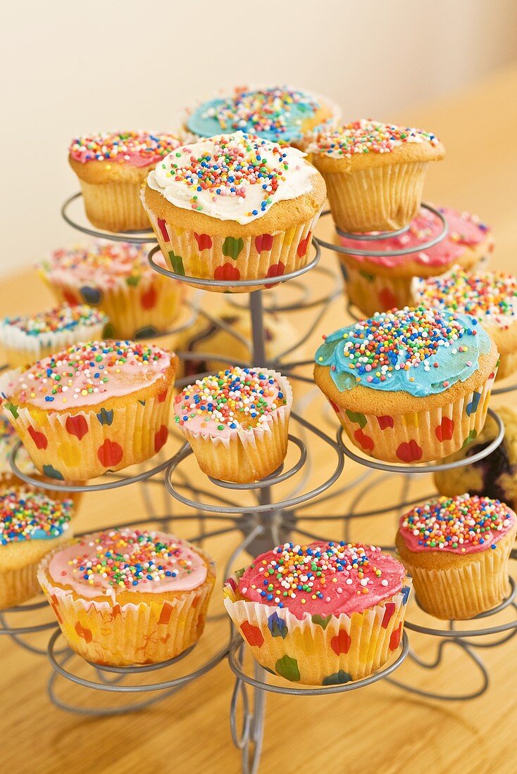 Colourful cupcakes on a cake stand