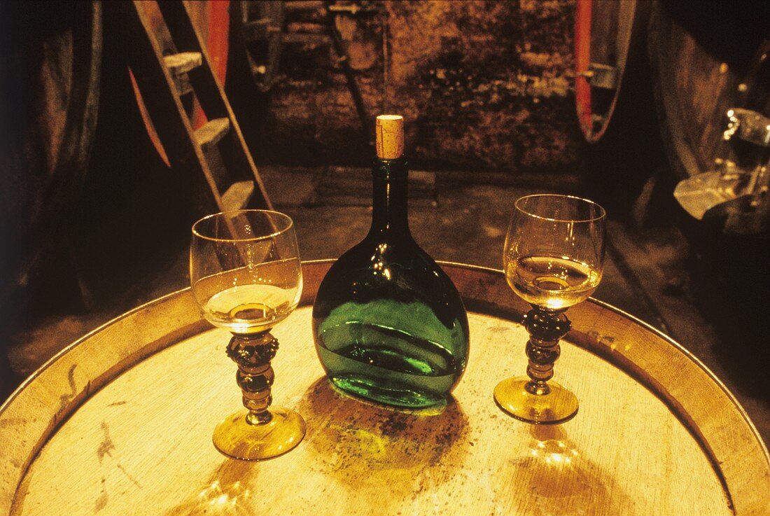 Typical Franconian Bocksbeutel (flat wine bottle) in old cellar