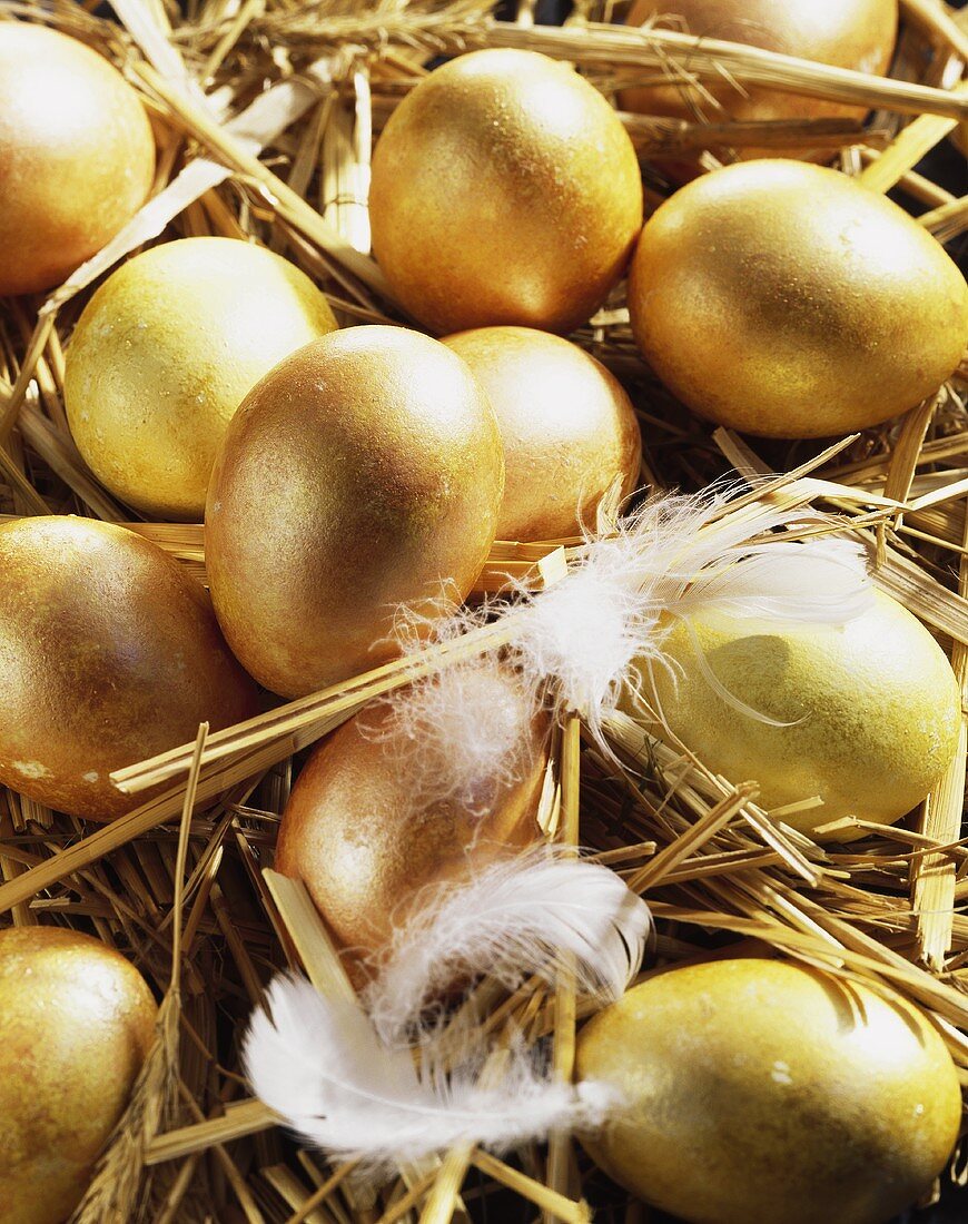 Golden Easter eggs in a nest