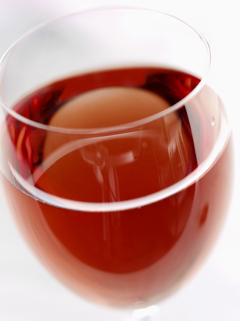 A glass of rosé wine