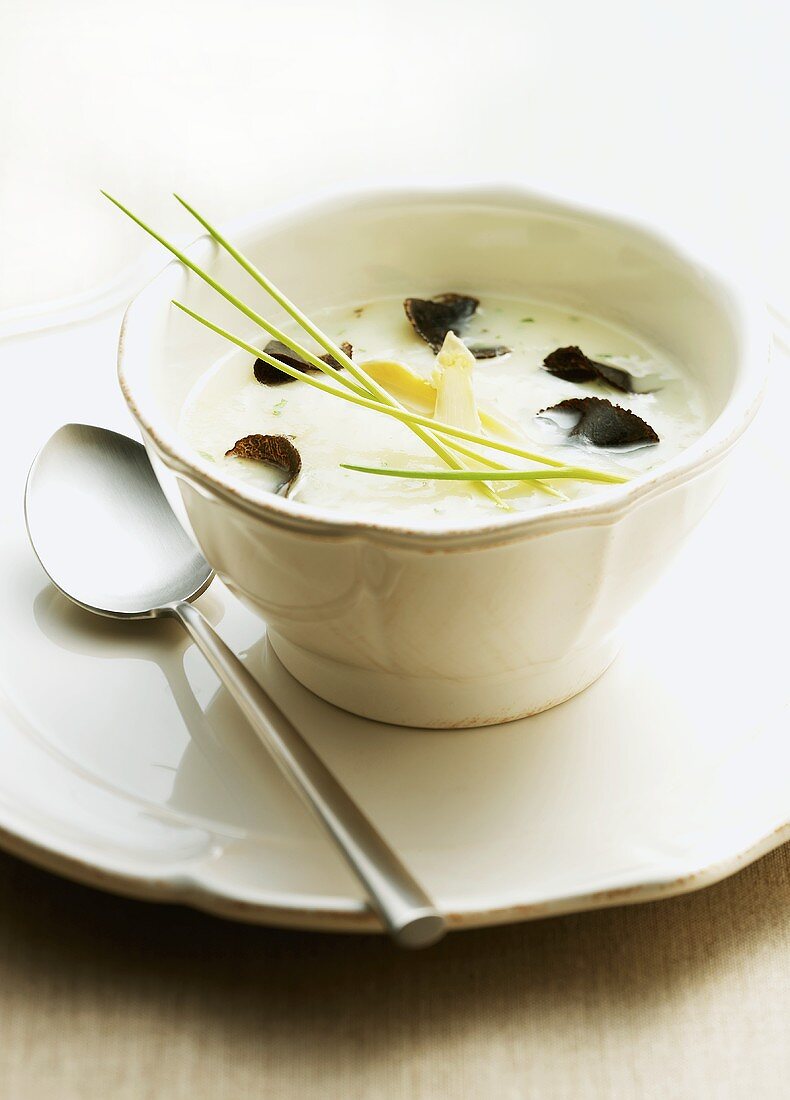 Asparagus and potato soup with black truffle