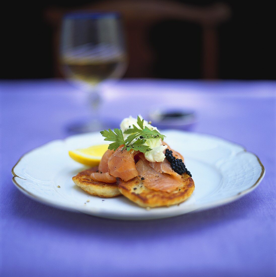 Blinis with salmon, caviar and crème fraiche