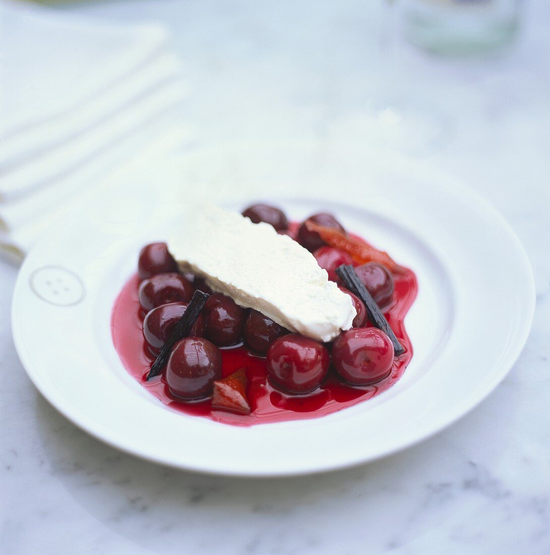 Cherry compote with vanilla ice cream