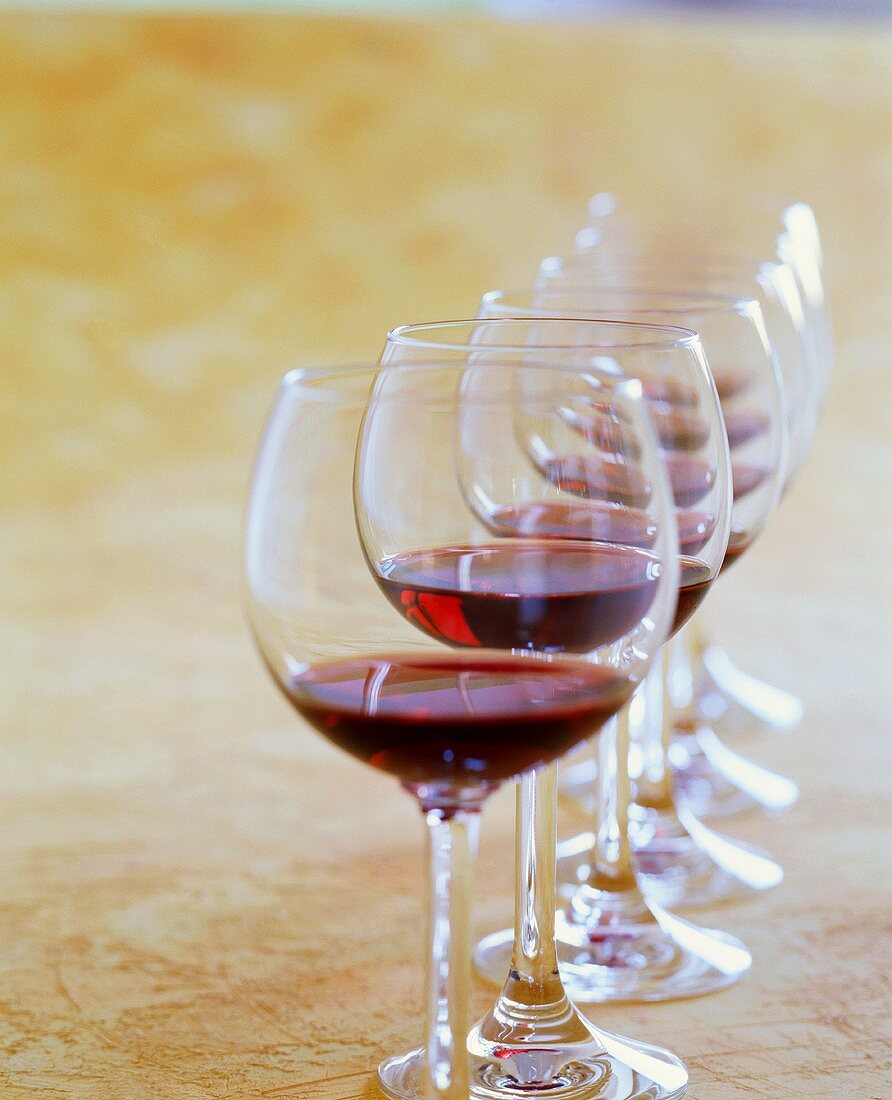 Row of red wine glasses