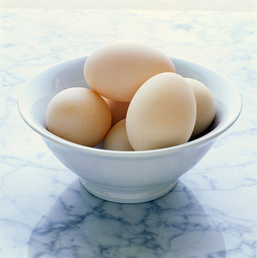 Eggs in white bowl