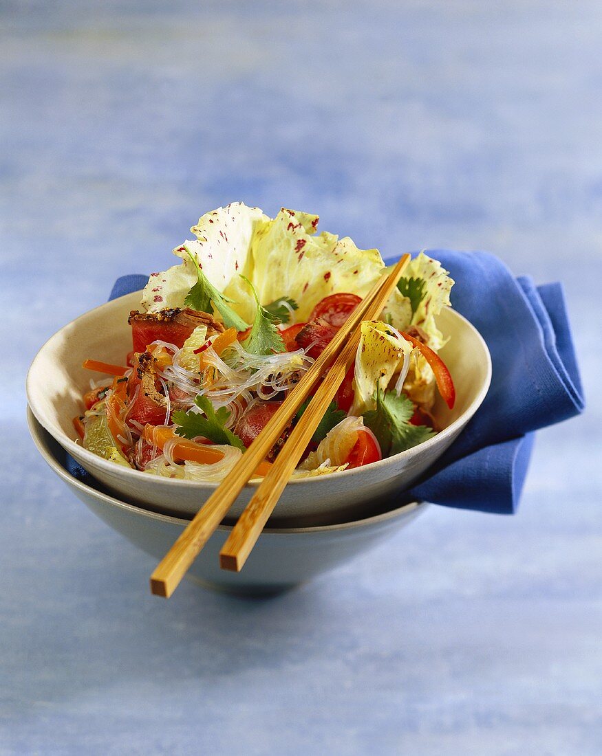 Glass noodle salad with vegetables and beef fillet