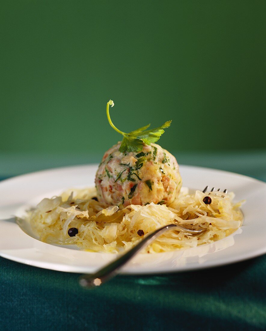 Tyrolean dumplings (bread dumplings with bacon) on sauerkraut