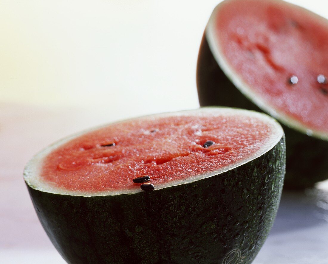Watermelon (Citrullus lanatus), halved