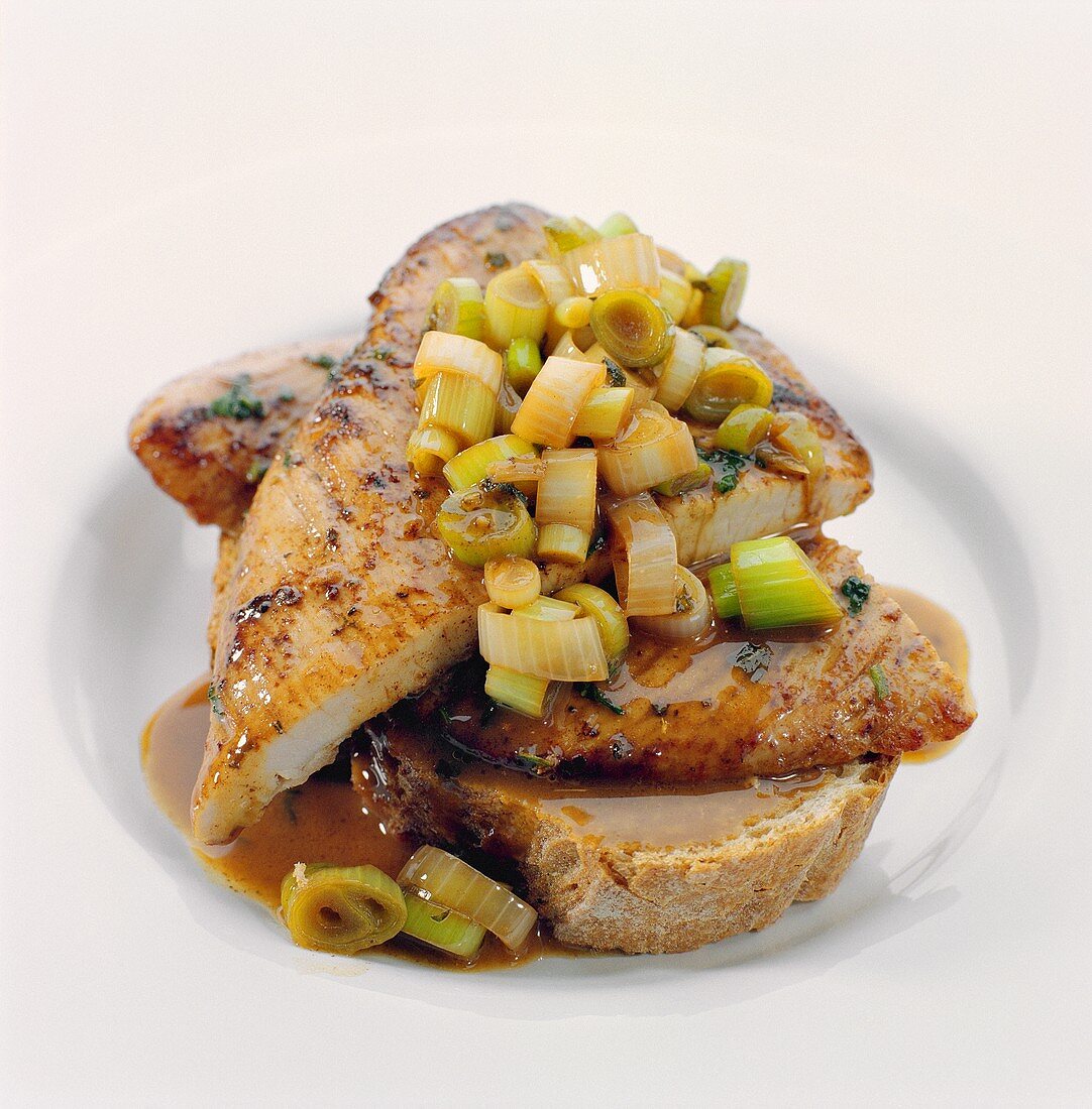 Chicken breast and spring onions in an open sandwich