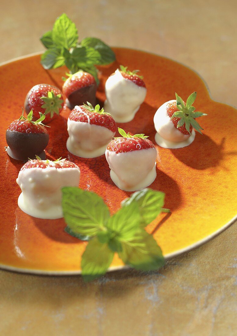 Strawberries with white and dark couverture