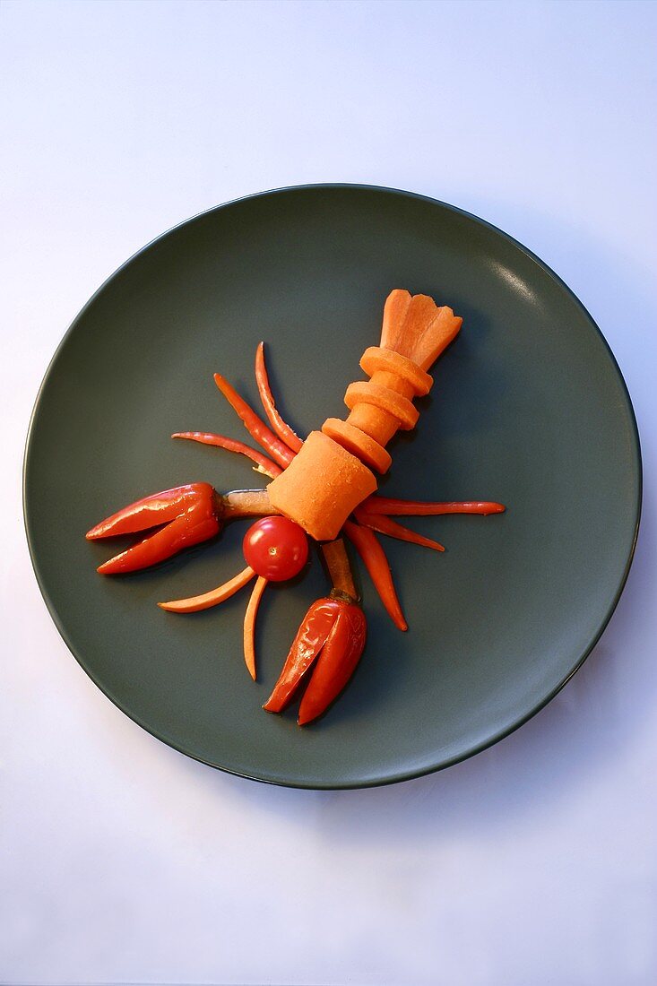 Lobster made from carrots, chillies and tomato