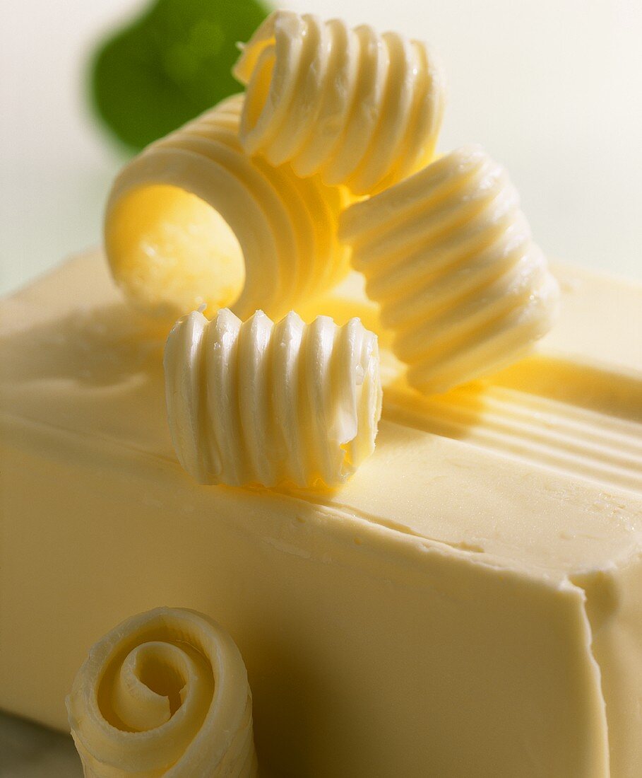 Block of butter with butter curls