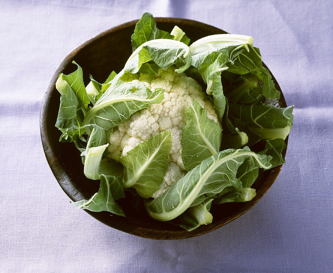 Cauliflower in wooden bowl