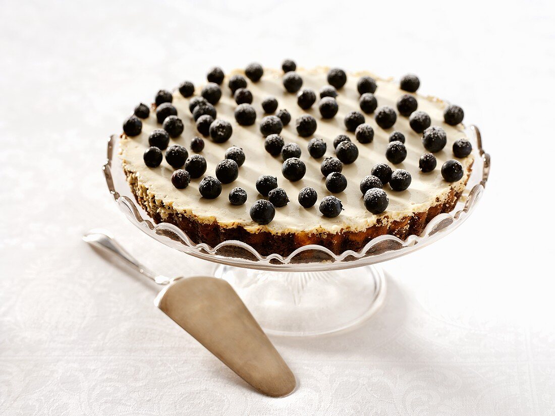 Blueberry tart on cake stand