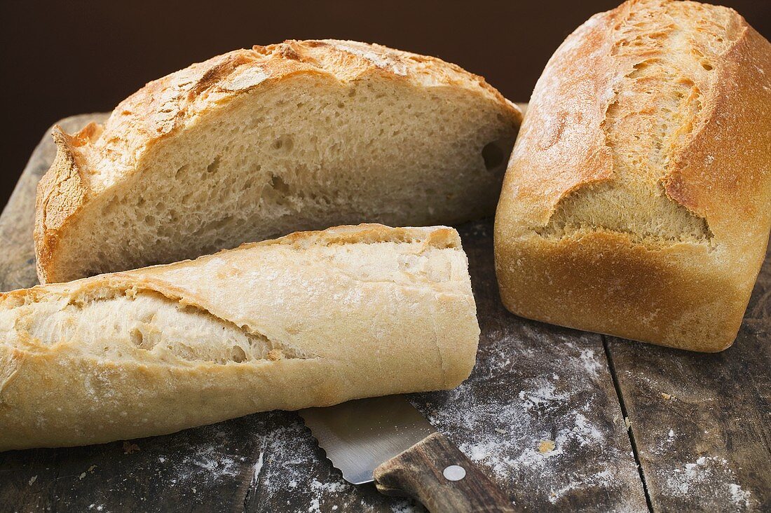 White tin loaf, baguette and farmhouse bread