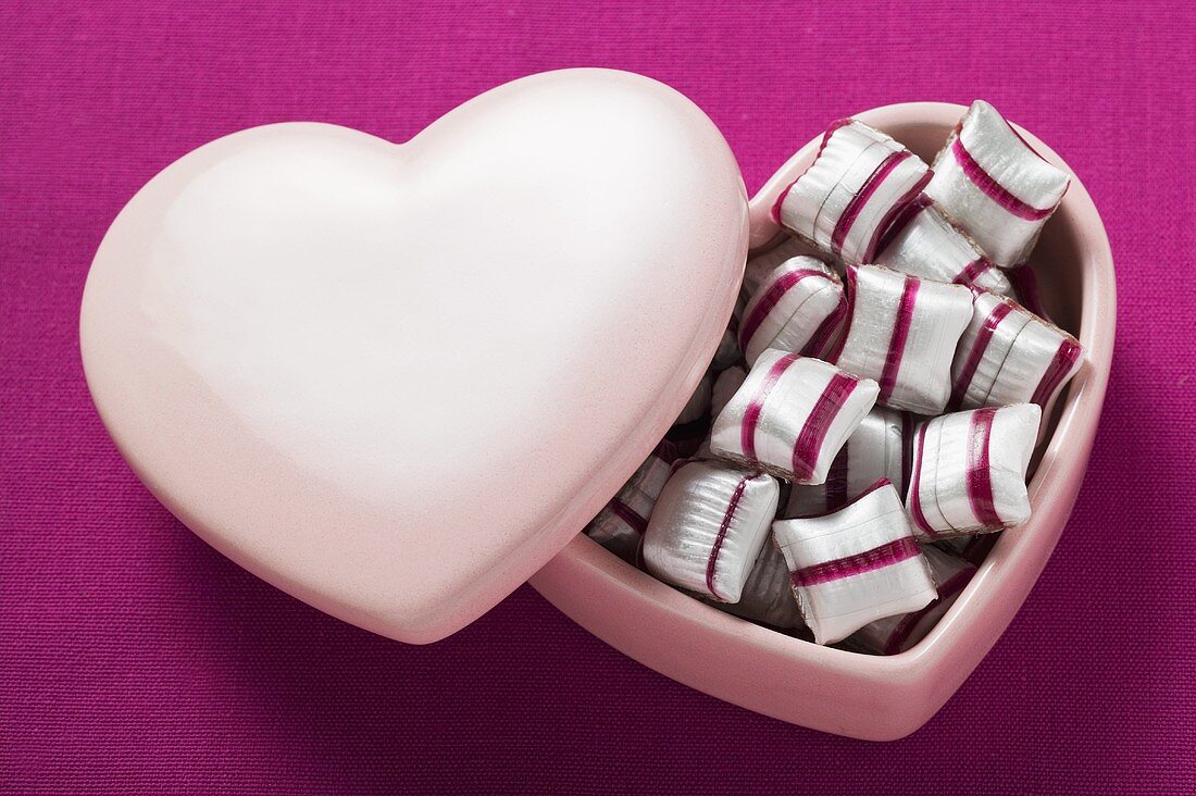 Cherry mint sweets in heart-shaped pink box