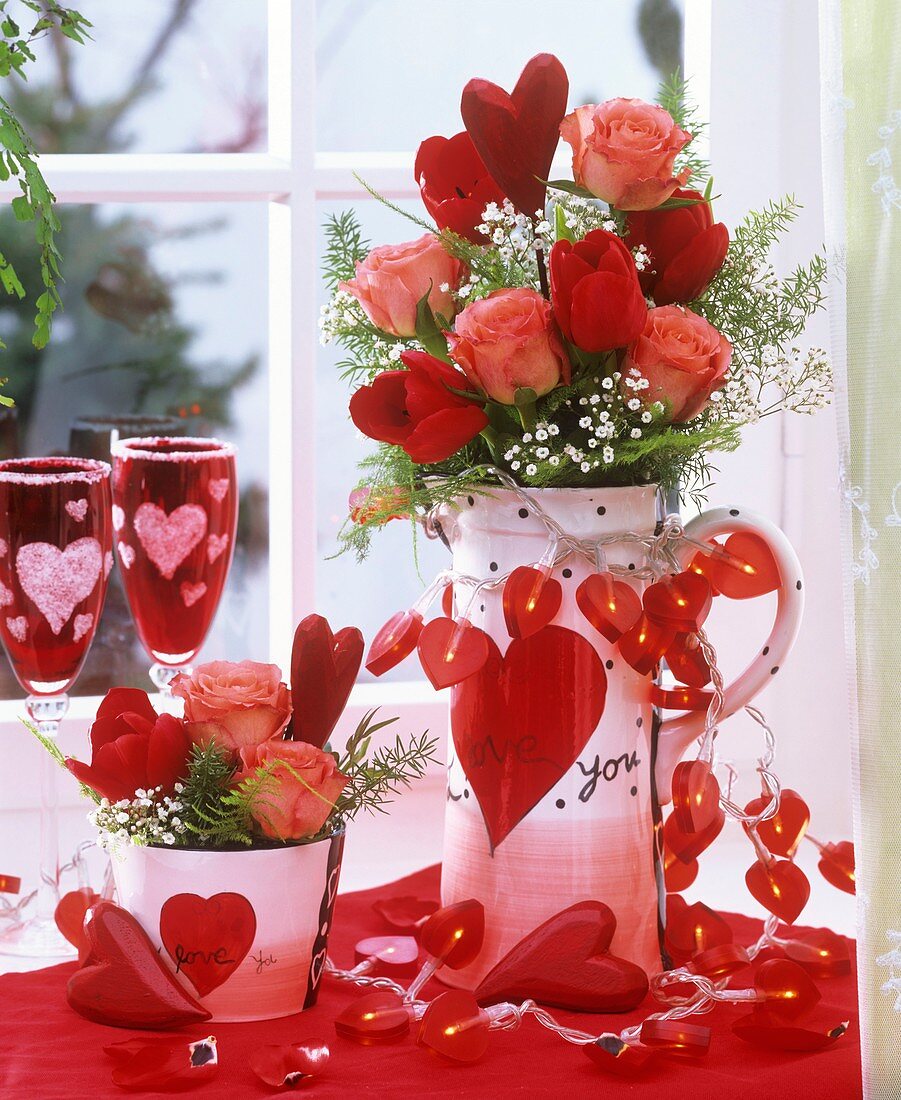 Valentine's Day table decoration of flowers & fairy lights