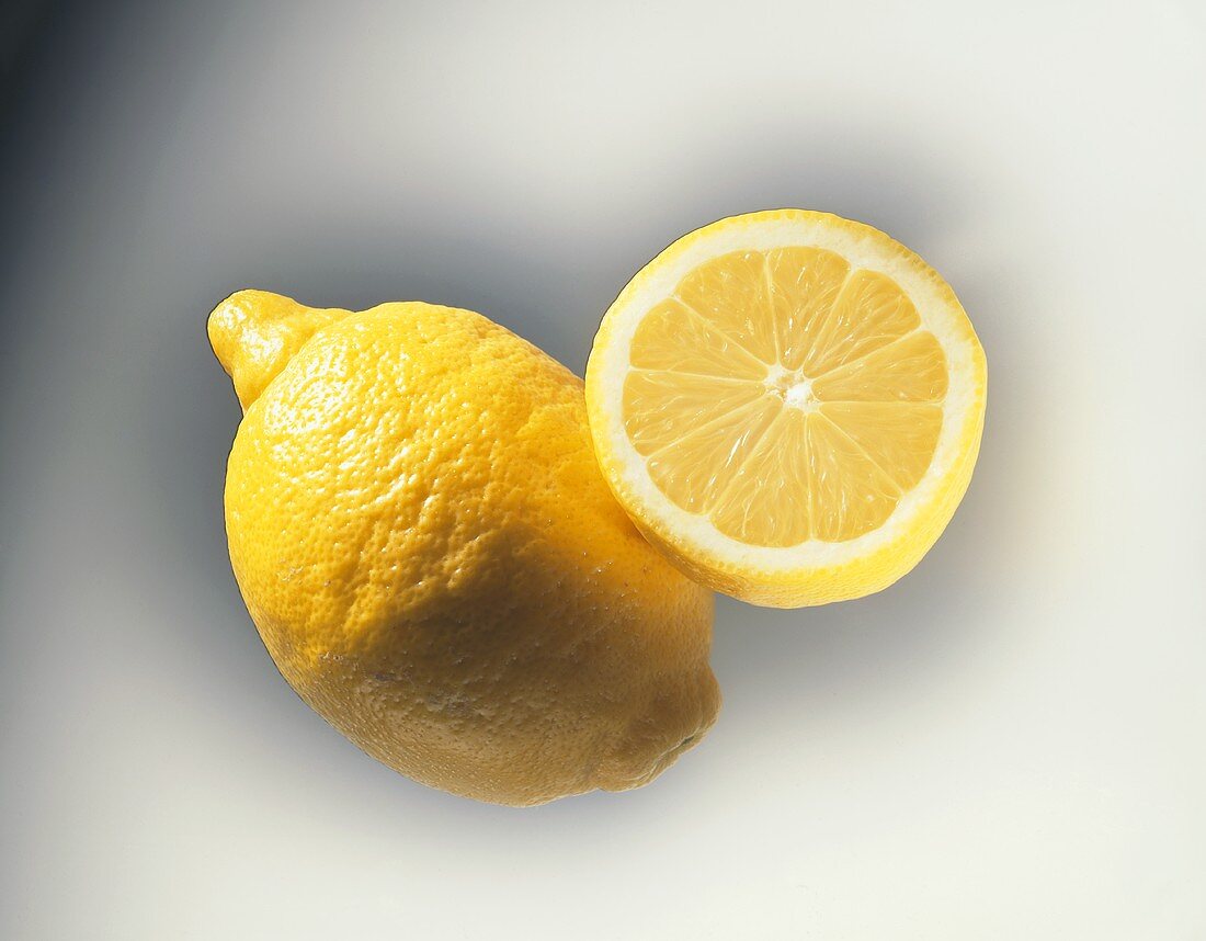 Whole and half lemon