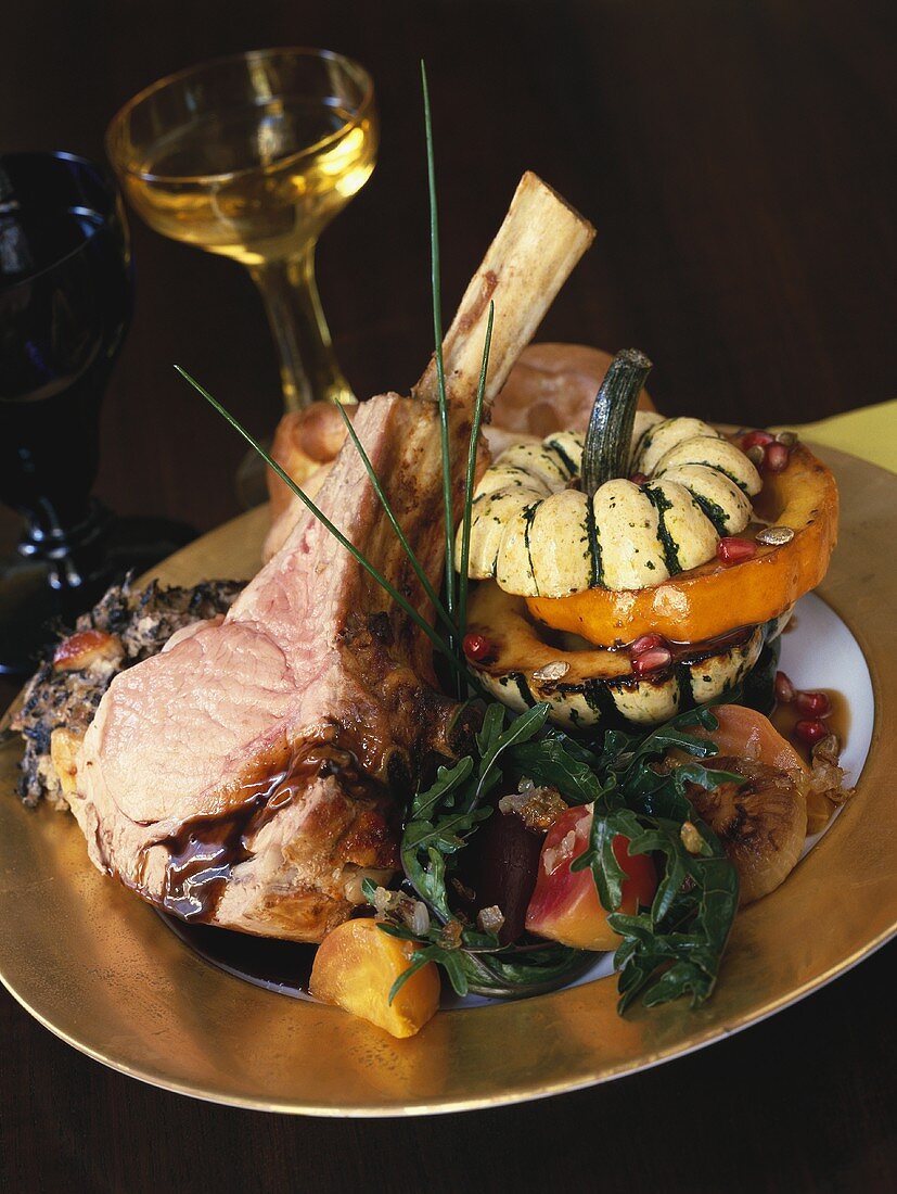 Pork chop with pumpkin and salad