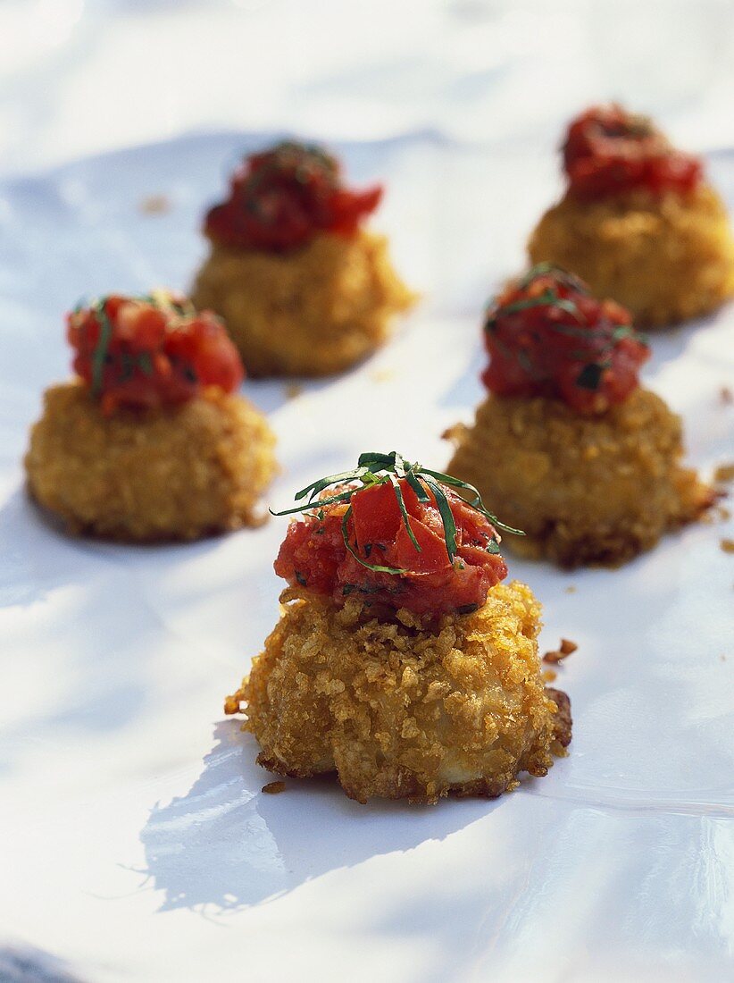 Mini-crab cakes with tomatoes