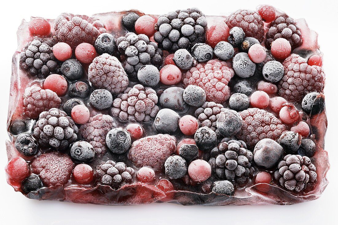 Frozen berries in a block of ice