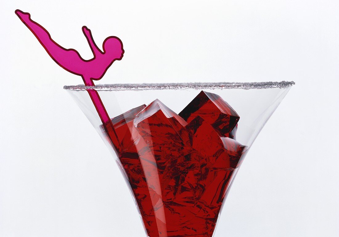 Red jelly cubes in a glass