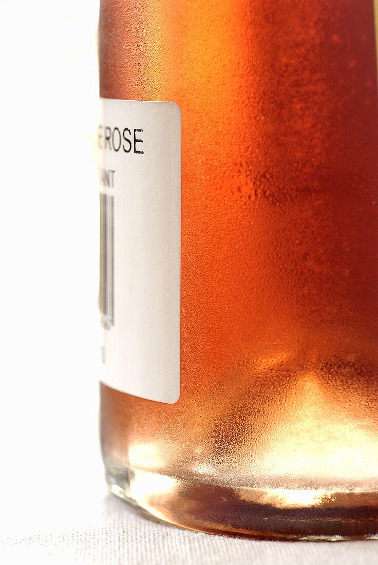Bottle of rosé wine with label (detail)